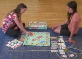 Photo of children playing Monopoly