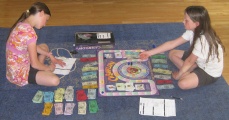 Photo of children playing Cashflow